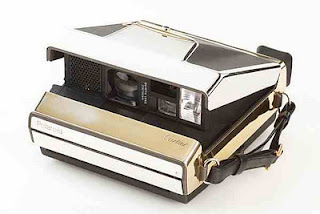 cartier 22k gold plated spectra camera